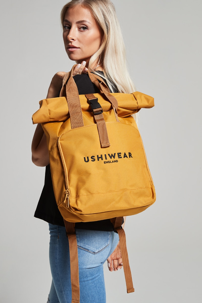 mustard purse outfit